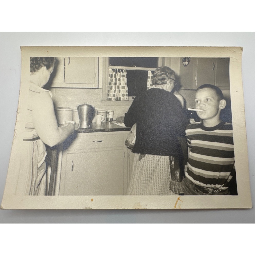 Vintage 1950s B&W Snapshot Boy in Striped Shirt Mid Century Kitchen Scene 3x5